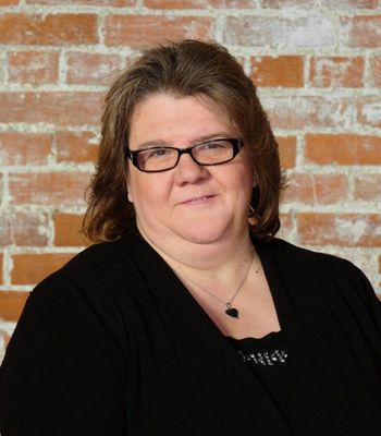 Portrait of Vicky Green, REALTOR®.